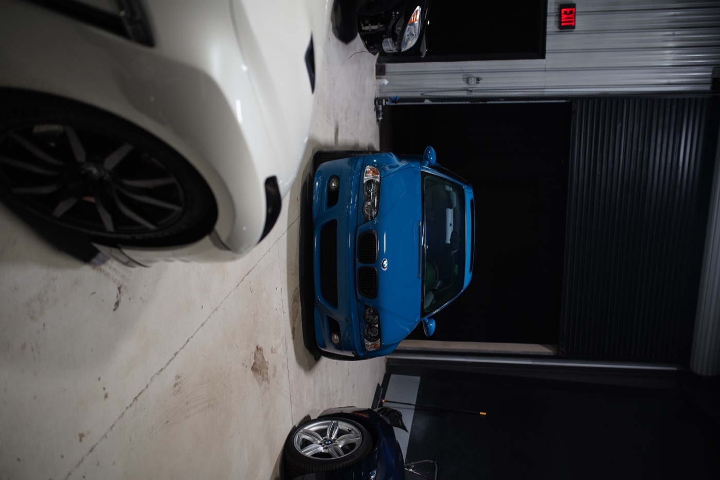 Blue BMW in the shop bay